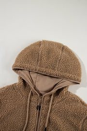 Brown sherpa hooded jacket with contrast lining and drawstring hood.