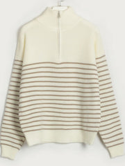 Cream ribbed knit sweater with horizontal caramel stripes and half-zip neckline.