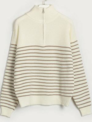 Cream ribbed knit sweater with horizontal caramel stripes and half-zip neckline.
