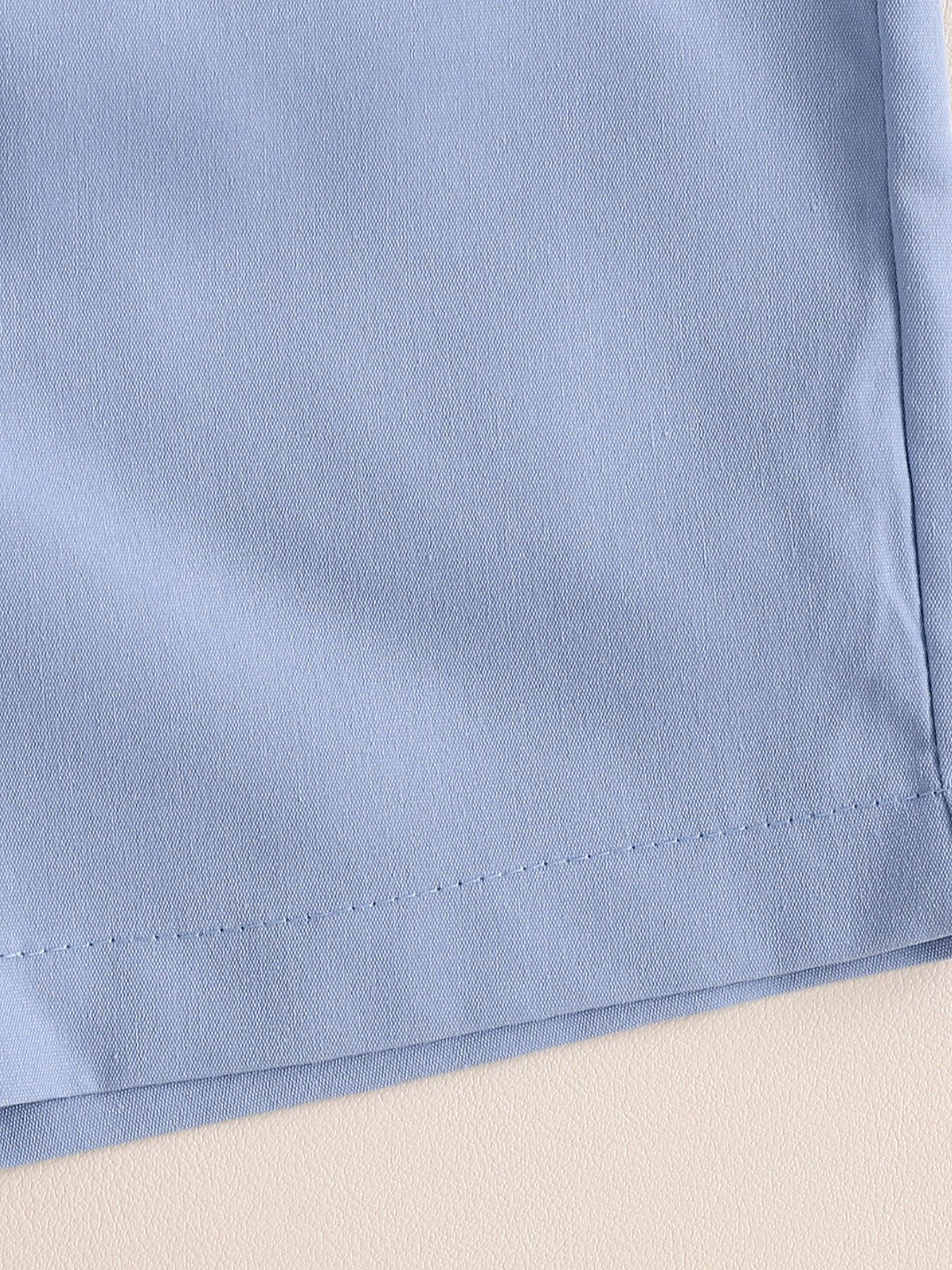 Sky blue toddler shorts with a stitched hem detail.