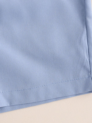 Sky blue toddler shorts with a stitched hem detail.