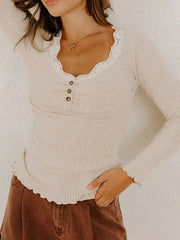 Beige ribbed long-sleeve top with lace trim neckline and button detail