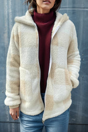Sherpa zip-up jacket with buffalo check pattern in cream and tan, featuring a hood and pockets.