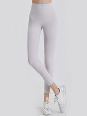 FlexFit 7/8 leggings in white with a wide waistband and seamless design.