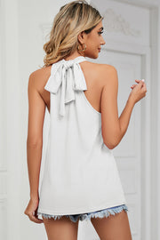 White halter tank top with a bow tie back detail