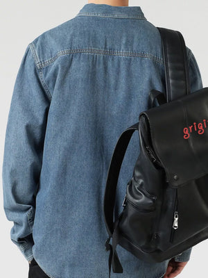 Blue denim shirt, relaxed fit, buttoned, 100% cotton, shown from the back.