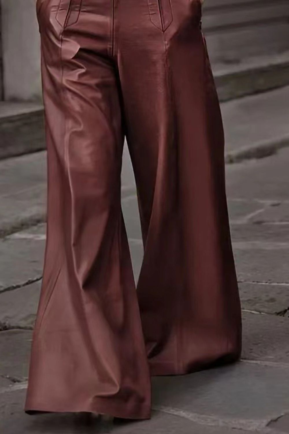 Burgundy wide-leg leather pants with buckle belt detail
