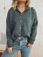 Gray ribbed knit cardigan with polo collar and buttons, styled with jeans.
