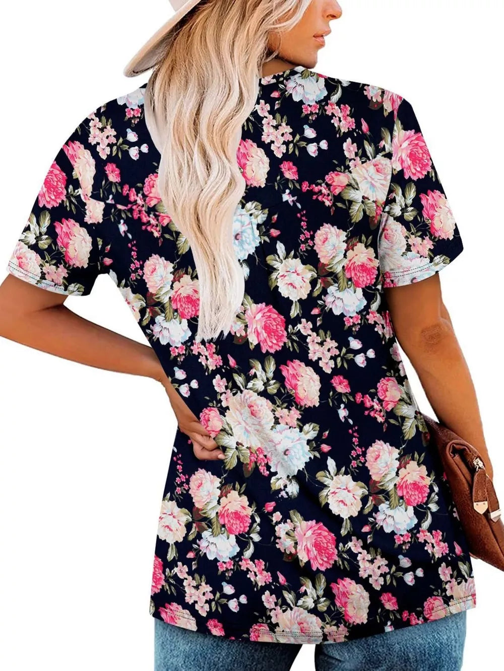 Floral ruched v-neck t-shirt in black with pink and white flowers, short sleeves.