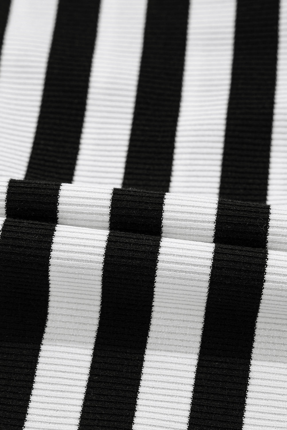 Black and white striped ribbed blouse with lace detail on back