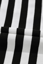 Black and white striped ribbed blouse with lace detail on back