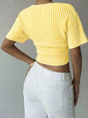 Yellow striped cropped t-shirt with batwing sleeves and smocked waist detail.