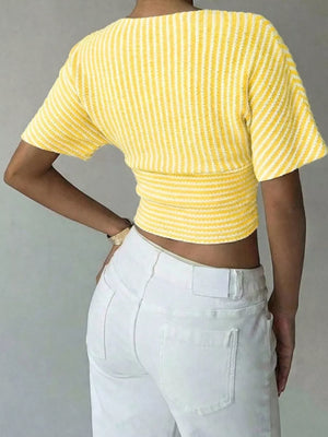 Yellow striped cropped t-shirt with batwing sleeves and smocked waist detail.