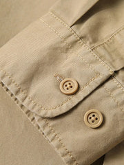 Khaki cotton men's relaxed fit shirt cuff detail with buttons.