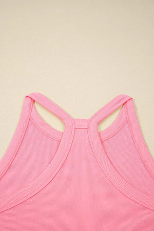 Ribbed cropped tank top in dusty pink with racerback detail and contrast trim.