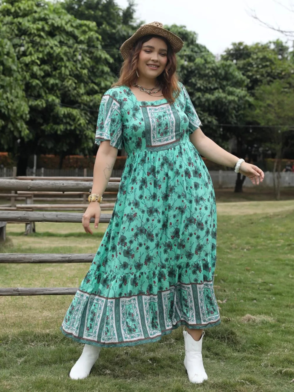Green floral maxi dress with square neck and tiered hem, short sleeves