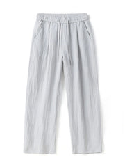 Lightweight wide-leg trousers in light gray with a drawstring waist and pockets.