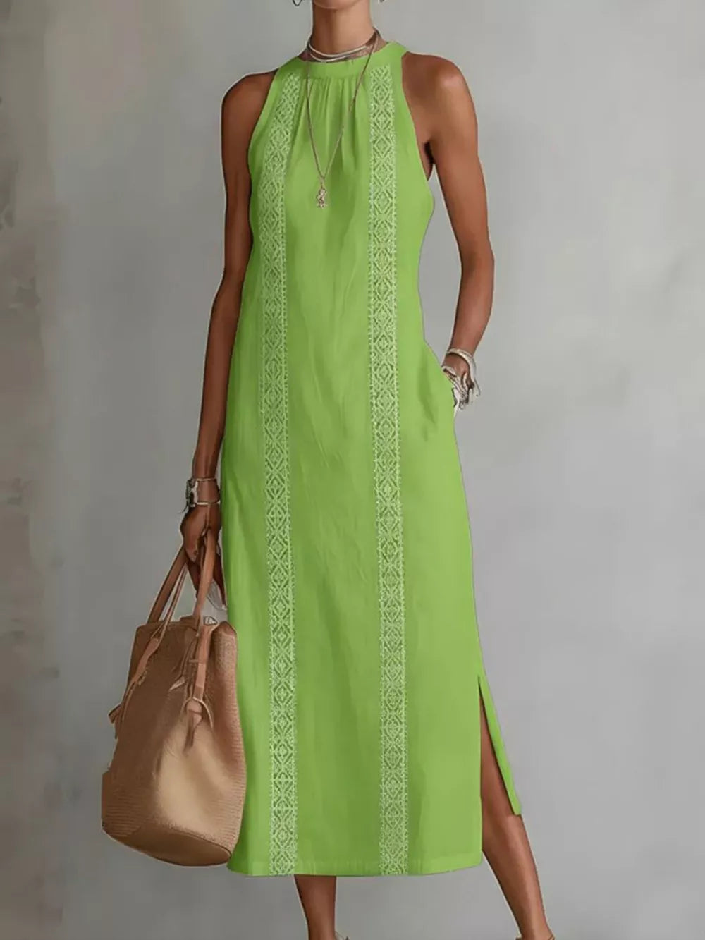 Light green sleeveless midi dress with geometric trim and pockets.