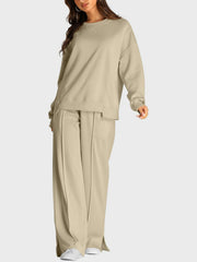 Tan seamed loungewear set with crewneck sweatshirt and slit-front wide-leg trousers