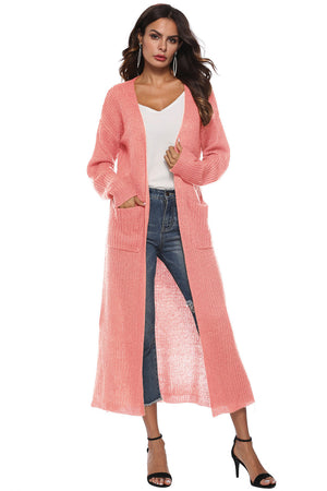 Coral longline knit cardigan with pockets and side slits, acrylic material