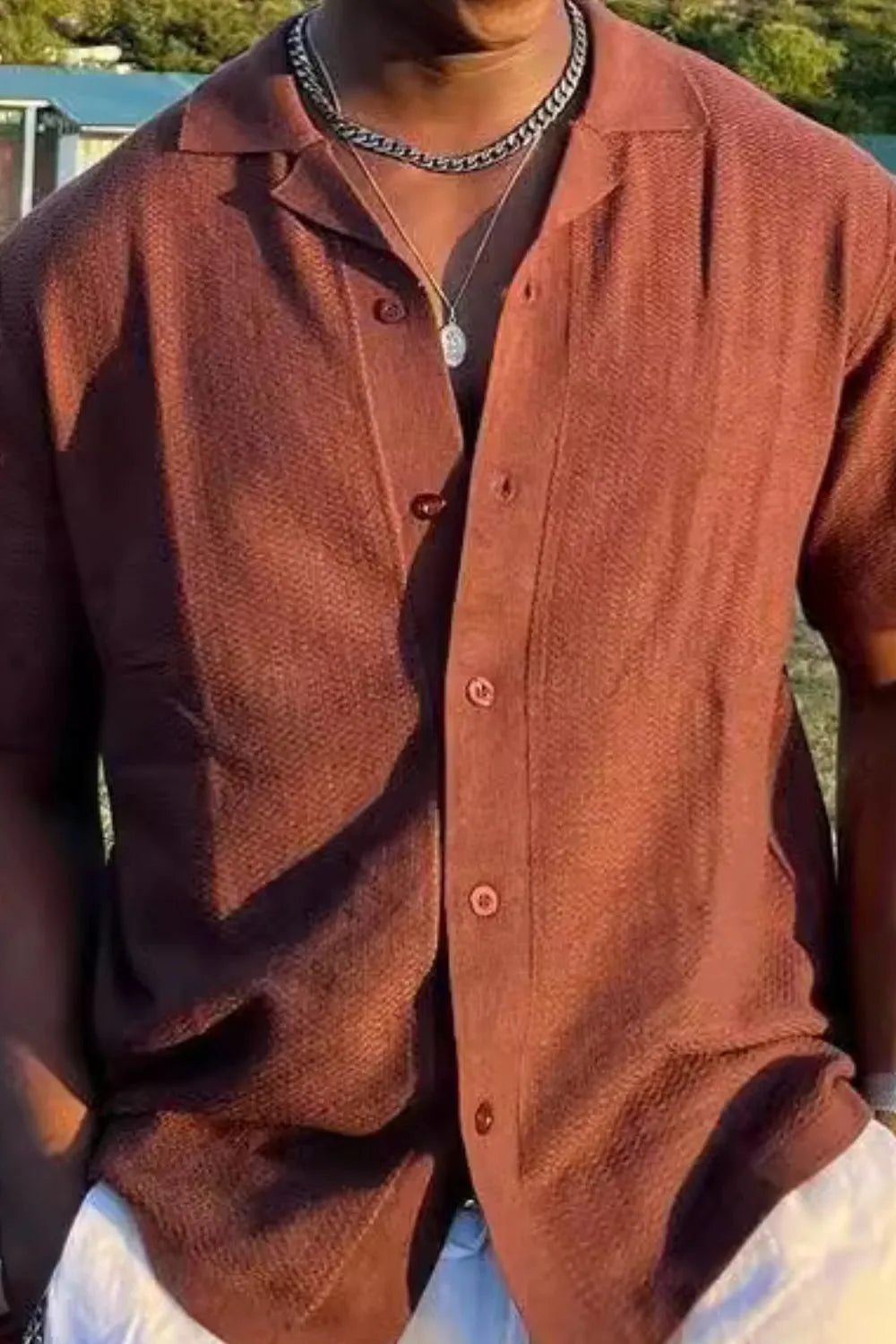 Textured Terracotta Cuban collar short sleeve shirt with button front and subtle herringbone pattern.