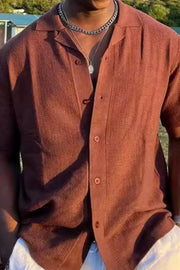 Textured Terracotta Cuban collar short sleeve shirt with button front and subtle herringbone pattern.