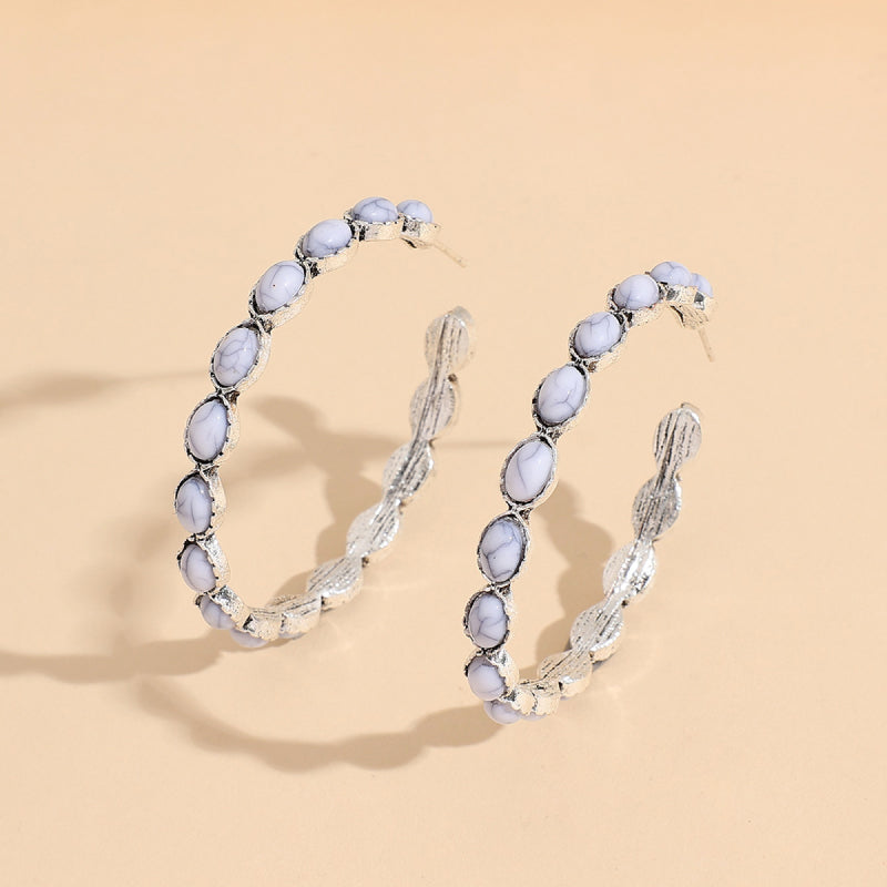 Textured white stone hoop earrings with silver alloy metalwork