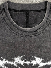 Black distressed graphic tee with distressed neckline and white graphic detail.