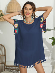 Dark blue tunic with crochet sleeves and tassel hem detail
