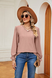 Dusty pink perforated sleeve blouse with ruffle cuffs and V-neck