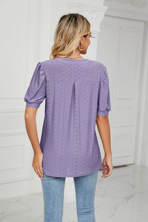 Purple perforated puff sleeve blouse with eyelet detail and back pleat.