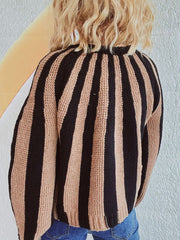 Bold stripe knit cardigan in tan and black, featuring a crew neck and button-up front.