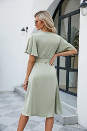 Light Green silk wrap midi dress with butterfly sleeves and adjustable tie waist.