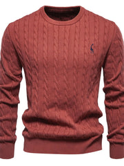 Rust cable knit crewneck sweater with embroidered giraffe detail