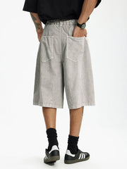 Men's light gray cotton wide-leg chino shorts with elastic waist and back pockets.