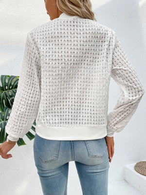 White textured mesh bomber jacket with a checkered pattern and ribbed cuffs and hem.