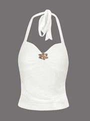 White ruched halter neck cami with floral embellishment and tie back.