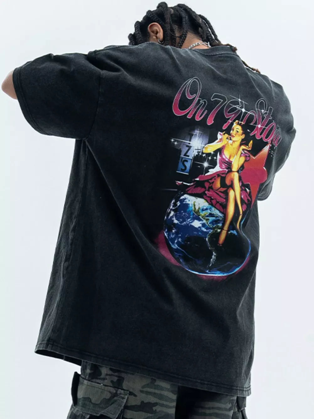 Black cotton graphic t-shirt with retro singer and Earth design on back