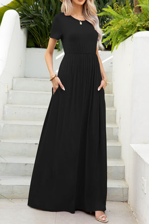 Black maxi dress with gathered waist, short sleeves, and pockets.