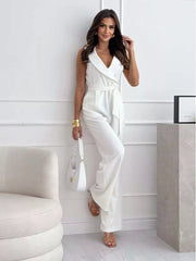 White wrap-front wide-leg romper with belted waist and V-neckline