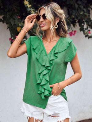 Green V-neck blouse with ruffled front and cap sleeves.