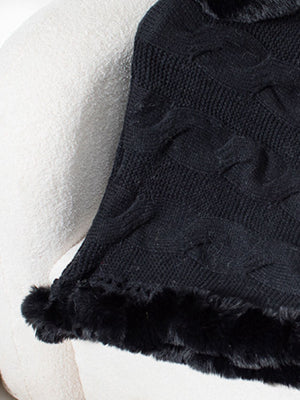 Black cable knit poncho with faux fur trim detail