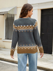 Dark gray acrylic sweater with Fair Isle yoke pattern in brown and white, crew neck, long sleeves.