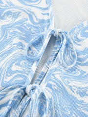 Blue and white marble print lounge set with tie-front detail