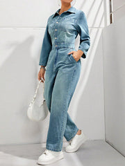 Structured light denim boiler suit with button front and collar, full length sleeves and legs.