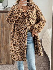 Leopard print shaggy button-down duster coat with pockets and collar.