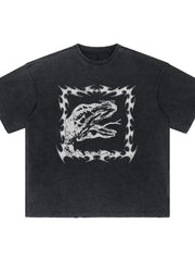 Black distressed graphic tee with dinosaur motif and tribal border.