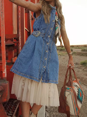 Belted denim western dress with button front, sleeveless, and a lace-trimmed hem.