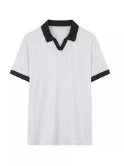 Men's white polo shirt with black contrast collar and sleeve trim, vertical texture detail.