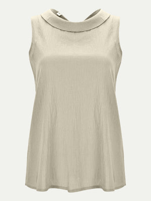 Sleeveless Peter Pan collar blouse in Eggshell with textured fabric.